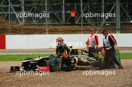 Romain Grosjean (FRA) Lotus F1 E20 spins out of qualifying. 07.07.2012. Formula 1 World Championship, Rd 9, British Grand Prix, Silverstone, England, Qualifying Day