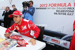 Felipe Massa (BRA) Ferrari signs autographs for the fans. 07.07.2012. Formula 1 World Championship, Rd 9, British Grand Prix, Silverstone, England, Qualifying Day