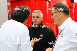 (L to R): Pasquale Lattuneddu (ITA) of the FOM with Derek Warwick (GBR) BRDC President and Richard Phillips (GBR) CEO Silverstone. 07.07.2012. Formula 1 World Championship, Rd 9, British Grand Prix, Silverstone, England, Qualifying Day