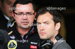 Jude Law (GBR) Actor with Eric Boullier (FRA) Lotus F1 Team Principal. 07.07.2012. Formula 1 World Championship, Rd 9, British Grand Prix, Silverstone, England, Qualifying Day