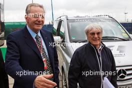 (L to R): Jacques Rogge (FRA) IOC President with Bernie Ecclestone (GBR) CEO Formula One Group (FOM). 08.07.2012. Formula 1 World Championship, Rd 9, British Grand Prix, Silverstone, England, Race Day
