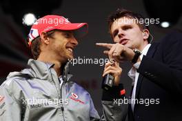 (L to R): Jenson Button (GBR) McLaren and Jake Humphrey (GBR) BBC Television Presenter at the post race concert. 08.07.2012. Formula 1 World Championship, Rd 9, British Grand Prix, Silverstone, England, Race Day