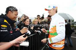 Nico Hulkenberg (GER) Sahara Force India F1 signs autographs for the fans at the post race concert. 08.07.2012. Formula 1 World Championship, Rd 9, British Grand Prix, Silverstone, England, Race Day