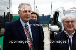 (L to R): Jacques Rogge (FRA) IOC President with Bernie Ecclestone (GBR) CEO Formula One Group (FOM). 08.07.2012. Formula 1 World Championship, Rd 9, British Grand Prix, Silverstone, England, Race Day