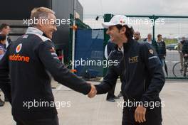 (L to R): Martin Whitmarsh (GBR) McLaren Chief Executive Officer with Pedro De La Rosa (ESP) HRT Formula 1 Team. 08.07.2012. Formula 1 World Championship, Rd 9, British Grand Prix, Silverstone, England, Race Day