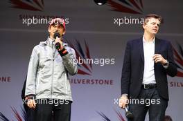 (L to R): Jenson Button (GBR) McLaren and Jake Humphrey (GBR) BBC Television Presenter at the post race concert. 08.07.2012. Formula 1 World Championship, Rd 9, British Grand Prix, Silverstone, England, Race Day