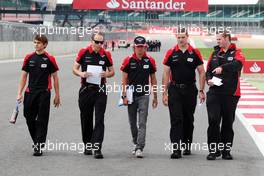 Charles Pic (FRA) Marussia F1 Team walks the circuit. 05.07.2012. Formula 1 World Championship, Rd 9, British Grand Prix, Silverstone, England, Preparation Day