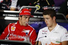 (L to R): Fernando Alonso (ESP) Ferrari and Paul di Resta (GBR) Sahara Force India F1 in the FIA Press Conference. 05.07.2012. Formula 1 World Championship, Rd 9, British Grand Prix, Silverstone, England, Preparation Day