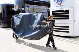A floor pan for the Red Bull Racing RB8 is carried through the paddock. 05.07.2012. Formula 1 World Championship, Rd 9, British Grand Prix, Silverstone, England, Preparation Day