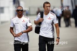 (L to R): Lewis Hamilton (GBR) McLaren with his Personal Trainer Antti Vierula (FIN). 05.07.2012. Formula 1 World Championship, Rd 9, British Grand Prix, Silverstone, England, Preparation Day