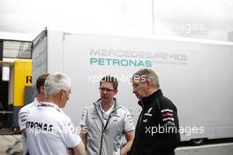 (L to R): Geoff Willis (GBR) Hispania Racing F1 Team (HRT) Technology Director with Andrew Shovlin (GBR) Mercedes AMG F1 Engineer and Ross Brawn (GBR) Mercedes AMG F1 Team Principal. 05.07.2012. Formula 1 World Championship, Rd 9, British Grand Prix, Silverstone, England, Preparation Day