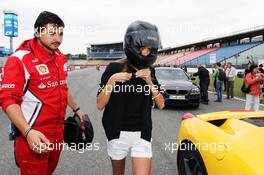 Dasha Kapustina (RUS), girlfriend of Fernando Alonso (ESP) Ferrari has a taxi ride. 20.07.2012. Formula 1 World Championship, Rd 10, German Grand Prix, Hockenheim, Germany, Practice Day