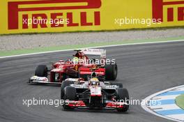 Lewis Hamilton (GBR) McLaren MP4/27 leads Felipe Massa (BRA) Ferrari F2012. 20.07.2012. Formula 1 World Championship, Rd 10, German Grand Prix, Hockenheim, Germany, Practice Day