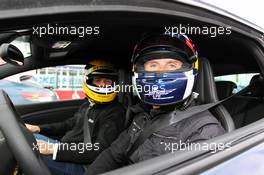 David Coulthard (GBR) Red Bull Racing and Scuderia Toro Advisor / BBC Television Commentator performs Taxi rides around the circuit. 20.07.2012. Formula 1 World Championship, Rd 10, German Grand Prix, Hockenheim, Germany, Practice Day