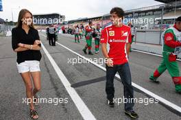 Fernando Alonso (ESP) Ferrari with girlfriend Dasha Kapustina (RUS). 20.07.2012. Formula 1 World Championship, Rd 10, German Grand Prix, Hockenheim, Germany, Practice Day