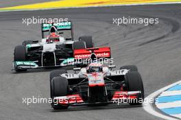 Jenson Button (GBR) McLaren MP4/27 leads Michael Schumacher (GER) Mercedes AMG F1 W03. 20.07.2012. Formula 1 World Championship, Rd 10, German Grand Prix, Hockenheim, Germany, Practice Day