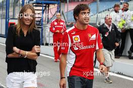 Fernando Alonso (ESP) Ferrari with his girlfriend Dasha Kapustina (RUS). 20.07.2012. Formula 1 World Championship, Rd 10, German Grand Prix, Hockenheim, Germany, Practice Day