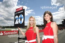 Gridgirls of Heikki Kovalainen (FIN), Caterham F1 Team 22.07.2012. Formula 1 World Championship, Rd 10, German Grand Prix, Hockenheim, Germany, Race Day
