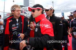 Sebastian Vettel (GER), Red Bull Racing and Timo Glock (GER), Marussia F1 Team  22.07.2012. Formula 1 World Championship, Rd 10, German Grand Prix, Hockenheim, Germany, Race Day
