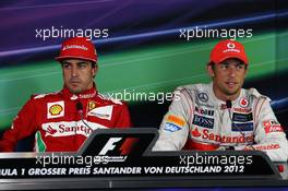 The FIA Press Conference (L to R): Fernando Alonso (ESP) Ferrari, race winner; Jenson Button (GBR) McLaren, third. 22.07.2012. Formula 1 World Championship, Rd 10, German Grand Prix, Hockenheim, Germany, Race Day