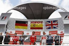 The podium (L to R):  Sebastian Vettel (GER) Red Bull Racing, second; Fernando Alonso (ESP) Ferrari, race winner; Jenson Button (GBR) McLaren, third. 22.07.2012. Formula 1 World Championship, Rd 10, German Grand Prix, Hockenheim, Germany, Race Day