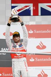 Jenson Button (GBR) McLaren celebrates his third position on the podium. 22.07.2012. Formula 1 World Championship, Rd 10, German Grand Prix, Hockenheim, Germany, Race Day