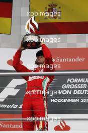 Race winner Fernando Alonso (ESP) Ferrari celebrates on the podium. 22.07.2012. Formula 1 World Championship, Rd 10, German Grand Prix, Hockenheim, Germany, Race Day