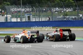 Paul di Resta (GBR) Sahara Force India VJM05 and Kimi Raikkonen (FIN) Lotus F1 E20 battle for position. 22.07.2012. Formula 1 World Championship, Rd 10, German Grand Prix, Hockenheim, Germany, Race Day