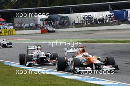 Paul di Resta (GBR) Sahara Force India VJM05 leads Sergio Perez (MEX) Sauber C31. 22.07.2012. Formula 1 World Championship, Rd 10, German Grand Prix, Hockenheim, Germany, Race Day