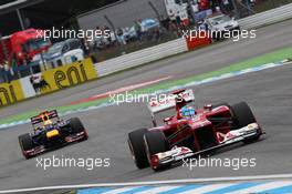 Fernando Alonso (ESP) Ferrari F2012 leads Sebastian Vettel (GER) Red Bull Racing RB8. 22.07.2012. Formula 1 World Championship, Rd 10, German Grand Prix, Hockenheim, Germany, Race Day