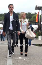 Adrian Sutil (GER) and his girlfriend Jennifer Becks (GER). 21.07.2012. Formula 1 World Championship, Rd 10, German Grand Prix, Hockenheim, Germany, Qualifying Day