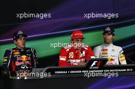 Qualifying top 3 FIA Press Conference (L to R): Sebastian Vettel (GER) Red Bull Racing, second; Fernando Alonso (ESP) Ferrari, pole position; Mark Webber (AUS) Red Bull Racing, third. 21.07.2012. Formula 1 World Championship, Rd 10, German Grand Prix, Hockenheim, Germany, Qualifying Day