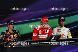Qualifying top 3 FIA Press Conference (L to R): Sebastian Vettel (GER) Red Bull Racing, second; Fernando Alonso (ESP) Ferrari, pole position; Mark Webber (AUS) Red Bull Racing, third. 21.07.2012. Formula 1 World Championship, Rd 10, German Grand Prix, Hockenheim, Germany, Qualifying Day