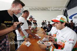 Jules Bianchi (FRA) Sahara Force India F1 Team Third Driver signs autographs for the fans. 21.07.2012. Formula 1 World Championship, Rd 10, German Grand Prix, Hockenheim, Germany, Qualifying Day