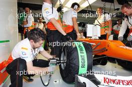 Sahara Force India F1 Team mechanic changes a tyre on the Sahara Force India F1 VJM05 of Nico Hulkenberg (GER). 21.07.2012. Formula 1 World Championship, Rd 10, German Grand Prix, Hockenheim, Germany, Qualifying Day