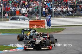 Kimi Raikkonen (FIN) Lotus F1 E20 ldeas Heikki Kovalainen (FIN) Caterham CT01. 21.07.2012. Formula 1 World Championship, Rd 10, German Grand Prix, Hockenheim, Germany, Qualifying Day
