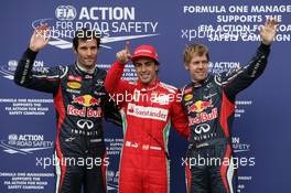 Qualifying: 3rd Mark Webber (AUS), Red Bull Racing, 1st Fernando Alonso (ESP), Scuderia Ferrari, 2nd Sebastian Vettel (GER), Red Bull Racing 21.07.2012. Formula 1 World Championship, Rd 10, German Grand Prix, Hockenheim, Germany, Qualifying Day