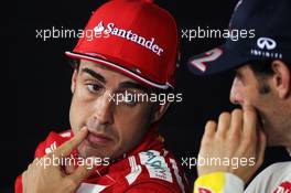 Pole sitter Fernando Alonso (ESP) Ferrari and Mark Webber (AUS) Red Bull Racing in the FIA Press Conference. 21.07.2012. Formula 1 World Championship, Rd 10, German Grand Prix, Hockenheim, Germany, Qualifying Day