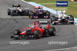 Timo Glock (GER) Marussia F1 Team MR01 leads Sergio Perez (MEX) Sauber C31; Daniel Ricciardo (AUS) Scuderia Toro Rosso STR7 and Heikki Kovalainen (FIN) Caterham CT01. 21.07.2012. Formula 1 World Championship, Rd 10, German Grand Prix, Hockenheim, Germany, Qualifying Day