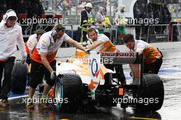 Nico Hulkenberg (GER) Sahara Force India F1 VJM05 pushed back in the pits. 21.07.2012. Formula 1 World Championship, Rd 10, German Grand Prix, Hockenheim, Germany, Qualifying Day