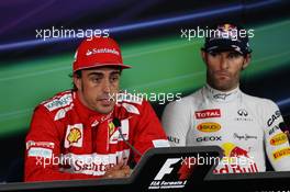 Pole sitter Fernando Alonso (ESP) Ferrari and Mark Webber (AUS) Red Bull Racing in the FIA Press Conference. 21.07.2012. Formula 1 World Championship, Rd 10, German Grand Prix, Hockenheim, Germany, Qualifying Day