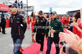 (L to R): Mark Webber (AUS) Red Bull Racing with Kimi Raikkonen (FIN) Lotus F1 Team and Heikki Kovalainen (FIN) Caterham on the drivers parade. 22.07.2012. Formula 1 World Championship, Rd 10, German Grand Prix, Hockenheim, Germany, Race Day