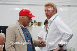 (L to R): Niki Lauda (AUT) with Boris Becker (GER) Tennis Legend. 22.07.2012. Formula 1 World Championship, Rd 10, German Grand Prix, Hockenheim, Germany, Race Day
