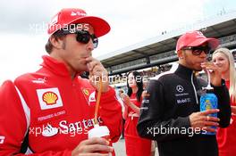 (L to R): Fernando Alonso (ESP) Ferrari with Lewis Hamilton (GBR) McLaren on the drivers parade. 22.07.2012. Formula 1 World Championship, Rd 10, German Grand Prix, Hockenheim, Germany, Race Day