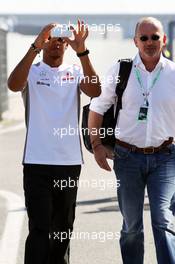 Lewis Hamilton (GBR) McLaren arrives at the circuit with Didier Coton (BEL) Driver Manager. 22.07.2012. Formula 1 World Championship, Rd 10, German Grand Prix, Hockenheim, Germany, Race Day