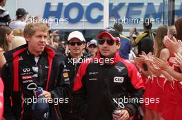 Sebastian Vettel (GER), Red Bull Racing and Timo Glock (GER), Marussia F1 Team 22.07.2012. Formula 1 World Championship, Rd 10, German Grand Prix, Hockenheim, Germany, Race Day