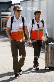 (L to R): Nico Hulkenberg (GER) Sahara Force India F1 and Jules Bianchi (FRA) Sahara Force India F1 Team Third Driver arrive at the circuit. 22.07.2012. Formula 1 World Championship, Rd 10, German Grand Prix, Hockenheim, Germany, Race Day