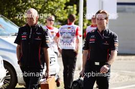(L to R): Adrian Newey (GBR) Red Bull Racing Chief Technical Officer arrives at the circuit with Christian Horner (GBR) Red Bull Racing Team Principal. 22.07.2012. Formula 1 World Championship, Rd 10, German Grand Prix, Hockenheim, Germany, Race Day