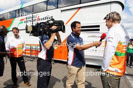Nico Hulkenberg (GER) Sahara Force India F1 is interviewed by Ted Kravitz (GBR) Sky Sports Pitlane Reporter. 22.07.2012. Formula 1 World Championship, Rd 10, German Grand Prix, Hockenheim, Germany, Race Day