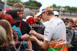 Nico Hulkenberg (GER), Sahara Force India Formula One Team with fans in the pit lane  19.07.2012. Formula 1 World Championship, Rd 10, German Grand Prix, Hockenheim, Germany, Preparation Day